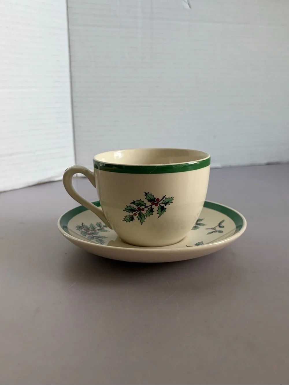 Spode Cream Teacup and Saucer with Green Holly and Red Berry Motif